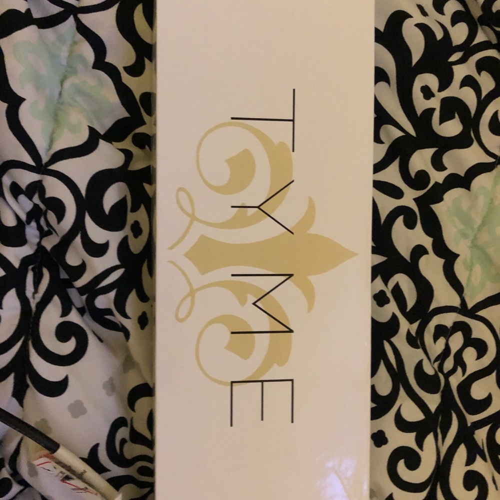 TYME IRON CURLING IRON AND STRAIGHTENER